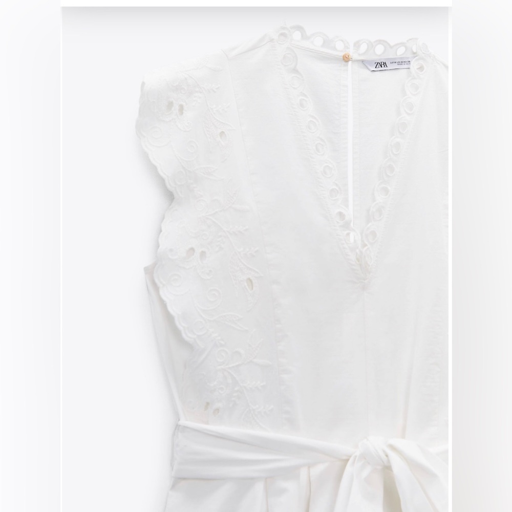 NWT Openwork Embroidery Romper with Bow Belt. Color is white. Size is small. - Picture 7 of 15